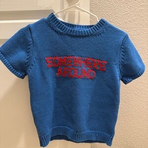 Blue Knit Shirt with Red Text